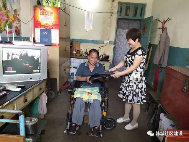 韩城市朝阳社区：帮扶贫困残疾人 共享社会关爱（图）