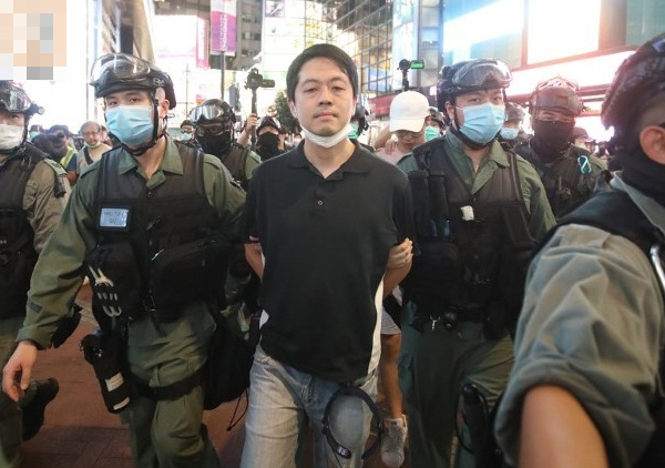 香港铜锣湾又现未经批准集结 反对派议员许智峰被捕