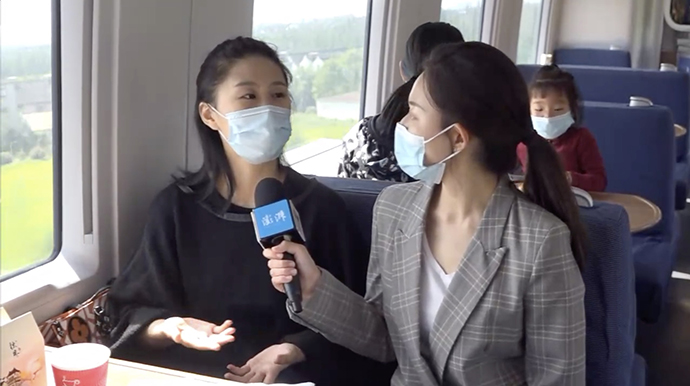 家在上海、杭高活当工作在杭州的城生宋女士是沪杭高铁的常客。直播视频截图